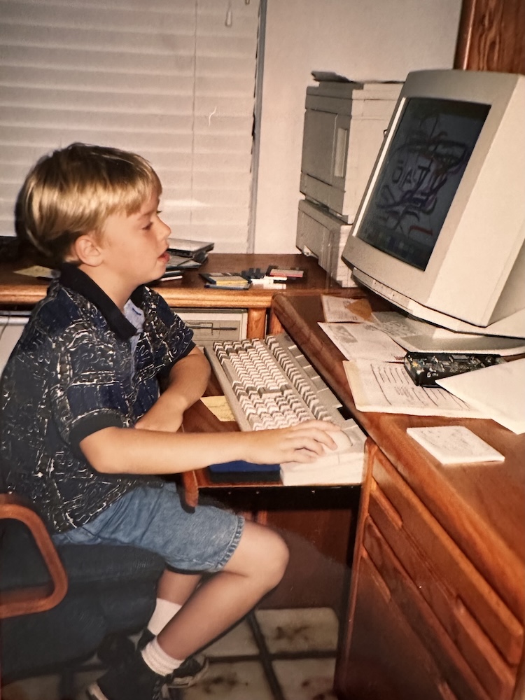 Jeff using a computer in the 90's
